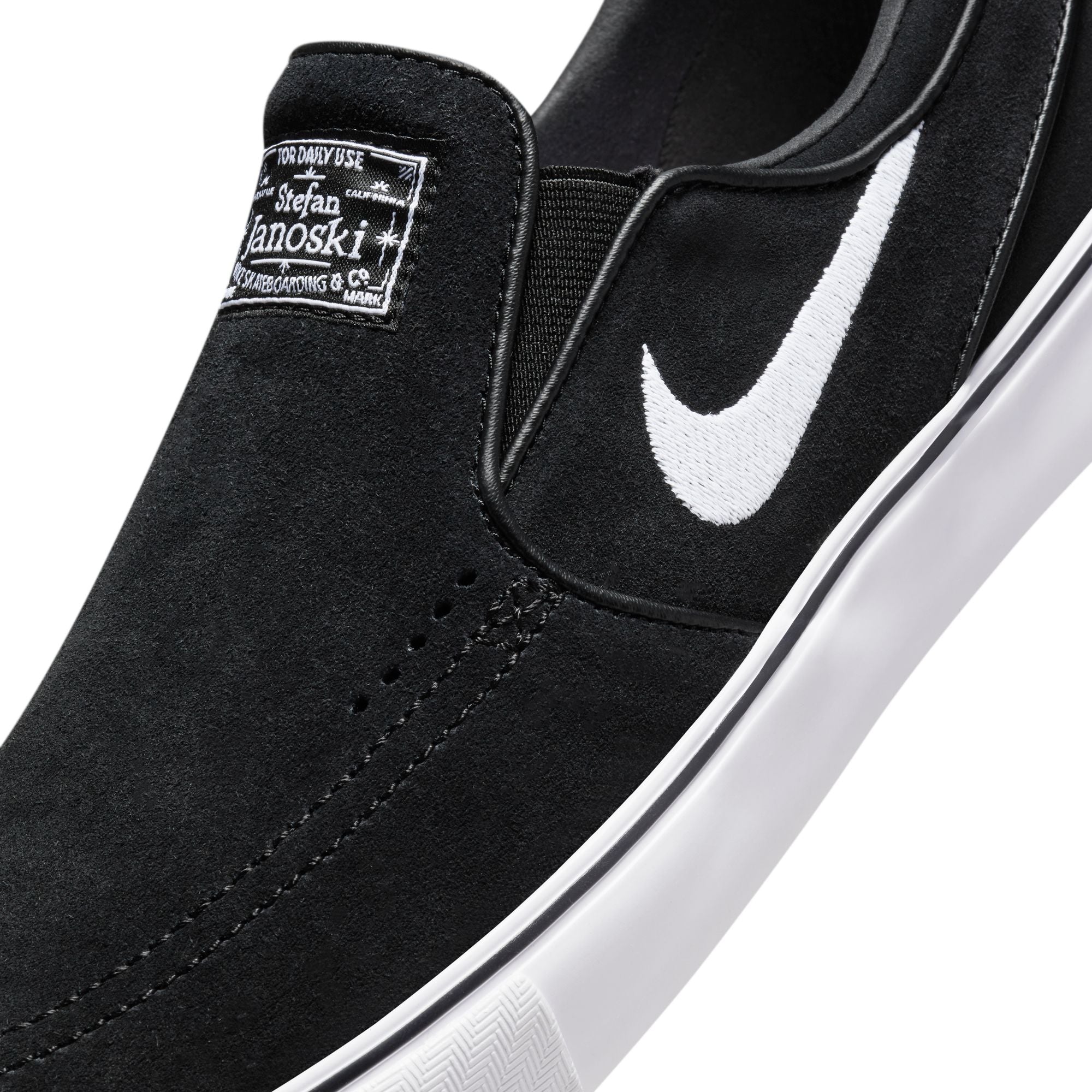 Nike slip on black online